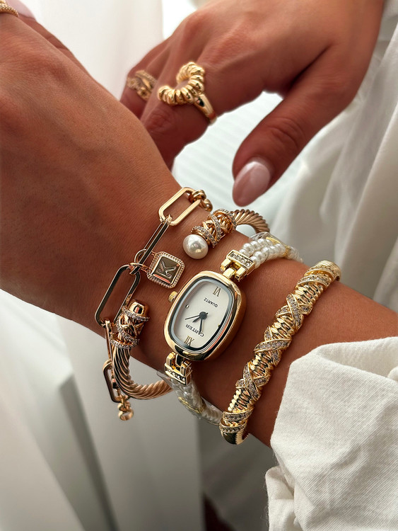 ساعت مچی زنانه بند مرواریدی طلایی صفحه سفید