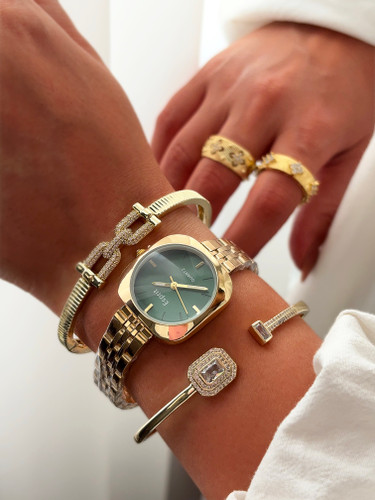 رنگ طلایی صفحه سبز ساعت مچی